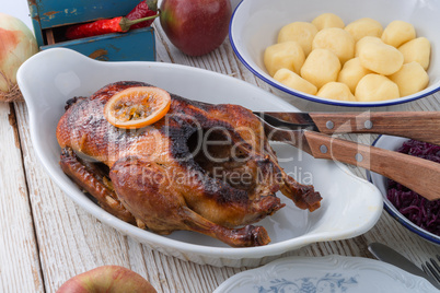 .duck with dumplings and pickled plum