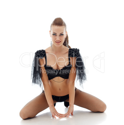 Beautiful smiling model posing in erotic costume
