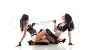 Image of two sexy babes posing dragging chain