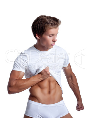 Portrait of athletic muscular man in white t-shirt