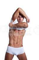Attractive young man shows pumped up torso