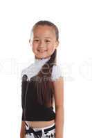 Portrait of graceful little girl smiling in studio