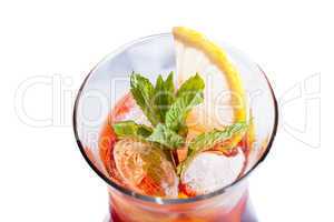 Spearmint in glass of cool lemonade, close-up