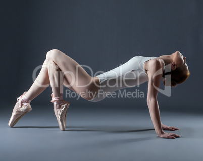 Portrait of emotional graceful dancer on pointes