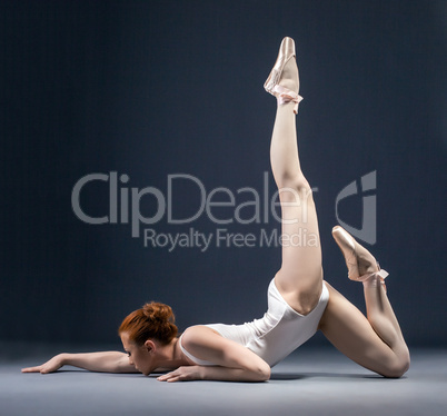 Image of flexible ballerina dancing in studio