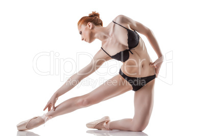 Sensual ballet dancer posing in black lingerie