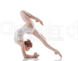 Attractive slim girl doing acrobatic trick
