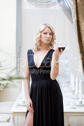 Image of charming woman in elegant black dress