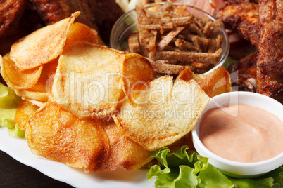 Delicious crunchy snacks with sauce