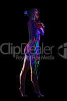 Slim nude model with glowing pattern on body