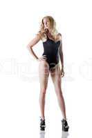 Tall slender blonde posing in black lingerie