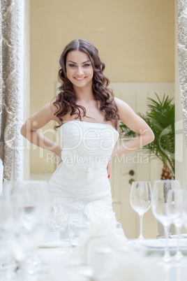 Portrait of smiling model posing in wedding dress