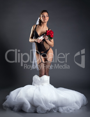 Proud bride posing in erotic lingerie