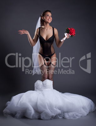 Happy beautiful bride posing in sexy underwear