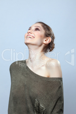 Beautiful woman laughing in studio