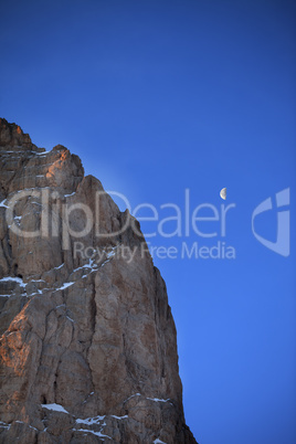 rocks at early morning and blue sky with moon