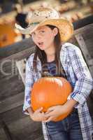 preteen girl portrait at the pumpkin patch