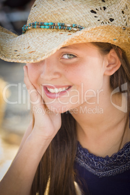 preteen girl portrait wearing cowboy hat