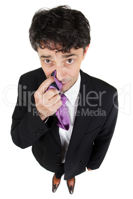 businessman tapping the side of his nose