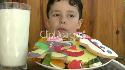 Child eating yummy cookies