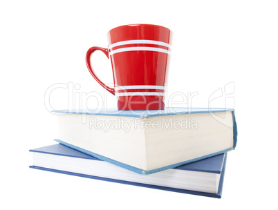 text books and coffee mug