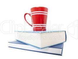 text books and coffee mug