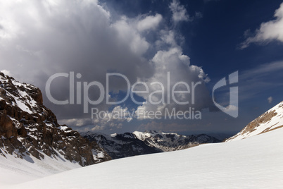 snowy mountains and sky with cloud
