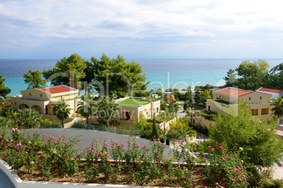 view on beach and villas at the modern luxury hotel, halkidiki,