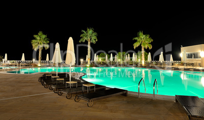 swimming pool in night illumination, halkidiki, greece