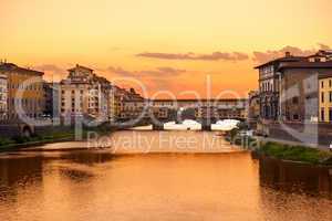 ponte vecchio sunset view over arno  river in florence
