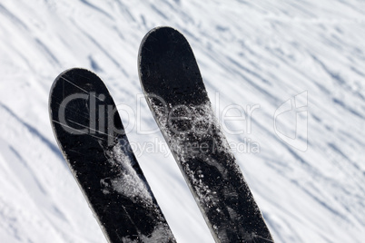 skis over off-piste slope