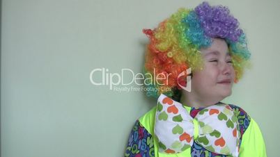 Little clown crying