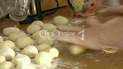 woman hands kneading dough