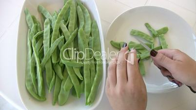 Hands Cutting Green Beans