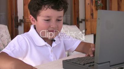 Little boy with computer