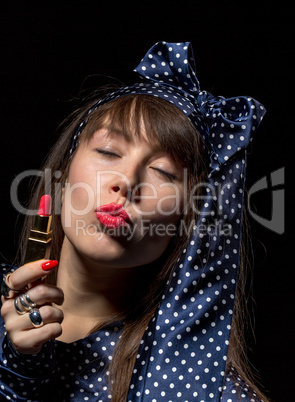 sexy sensual woman applying red lipstick