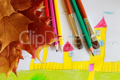 children's drawing of house and autumn leaves