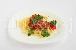 spaghetti bolognese on white plate