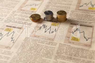 newspaper stock market with money