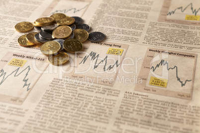 newspaper stock market with money