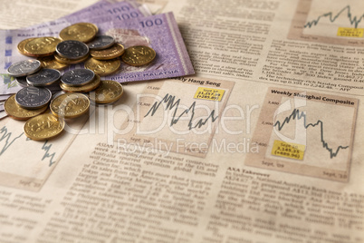 newspaper stock market with money