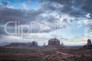 big cloud on mesa in monument valley