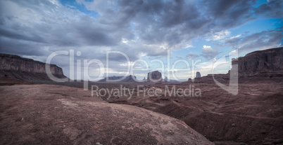 big cloud with sand in monument valley panorama