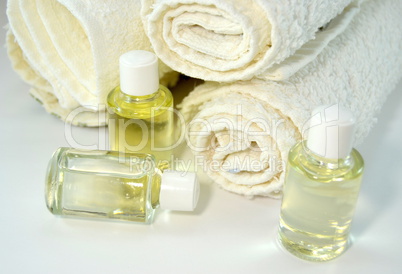stack of towels with skin oils