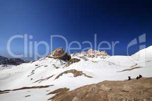 two hikers on halt in snowy mountain