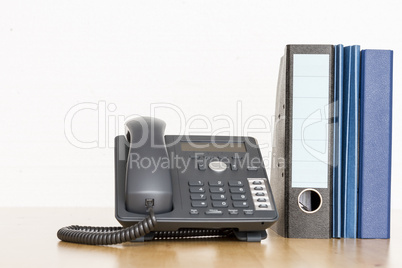 modern business phone with ring binder