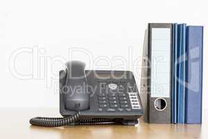 modern business phone with ring binder