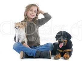 child and dogs