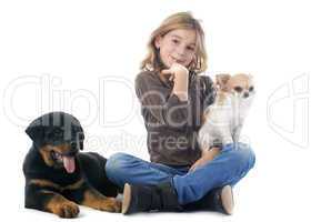 child and dogs