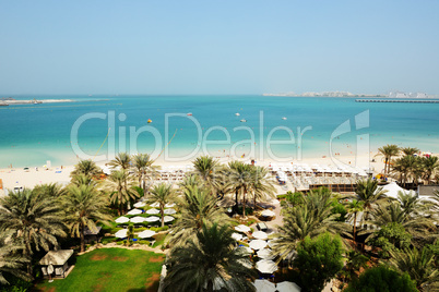 beach with a view on jumeirah palm man-made island, dubai, uae